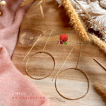 Boucle d'oreille pendante avec anneau diamanté