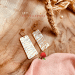 Boucles d'oreilles en résine en forme de quadrilatère aux coloris blanc et doré