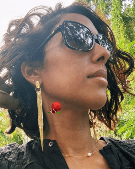 Boucle d'oreilles pendantes composée de 18 petites chainettes