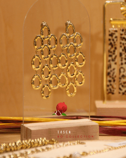 Boucle d'oreille pendante très originale texturée et ajourée 