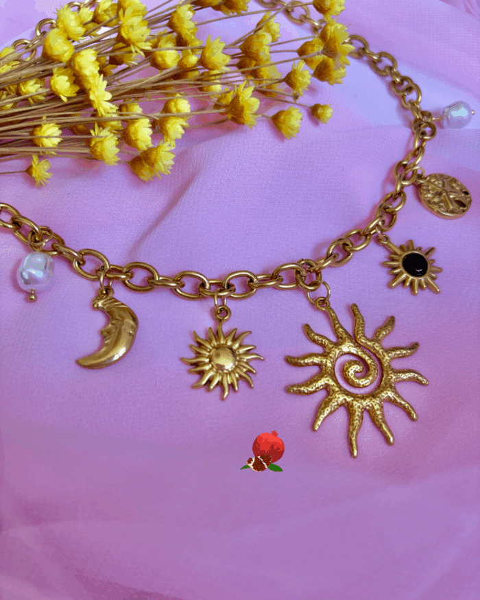 Collier composé de 7 breloques en acier inoxydable avec breloques : perles nacrées, soleil, lune, astres, ...
