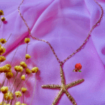 Sautoir en acier inoxydable avec grande étoile de mer texturée