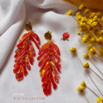 Boucle d'oreille pendante en forme de feuilles en résine