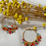 Boucle d'oreille créole avec pampilles multicolore  Créole en acier inoxydable (diamètre 3 cm) Longueur : 4 cm