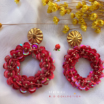 Boucle d’oreille avec pendentif rond tissée et clou d'oreille en acier inoxydable Coloris rose fuchsia
