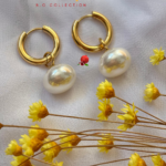 Boucle d’oreille avec petite créole en acier inoxydable  Pampille perle d'eau douce fantaisie (diamètre 1,5cm) Poids : 3 grs